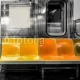 New York City subway car interior with colorful seats, 45x45, Papel Pared, Acabado LISO, Original, Todo color