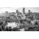 Cityscape view on the financial district with modern buildings, river and bridge during the sunset in Vilnius, Lithuania., 390x240, Papel Fotográfico, Papel Poster 150 gr. (posters y mupis publicitarios), Original, Blanco y negro